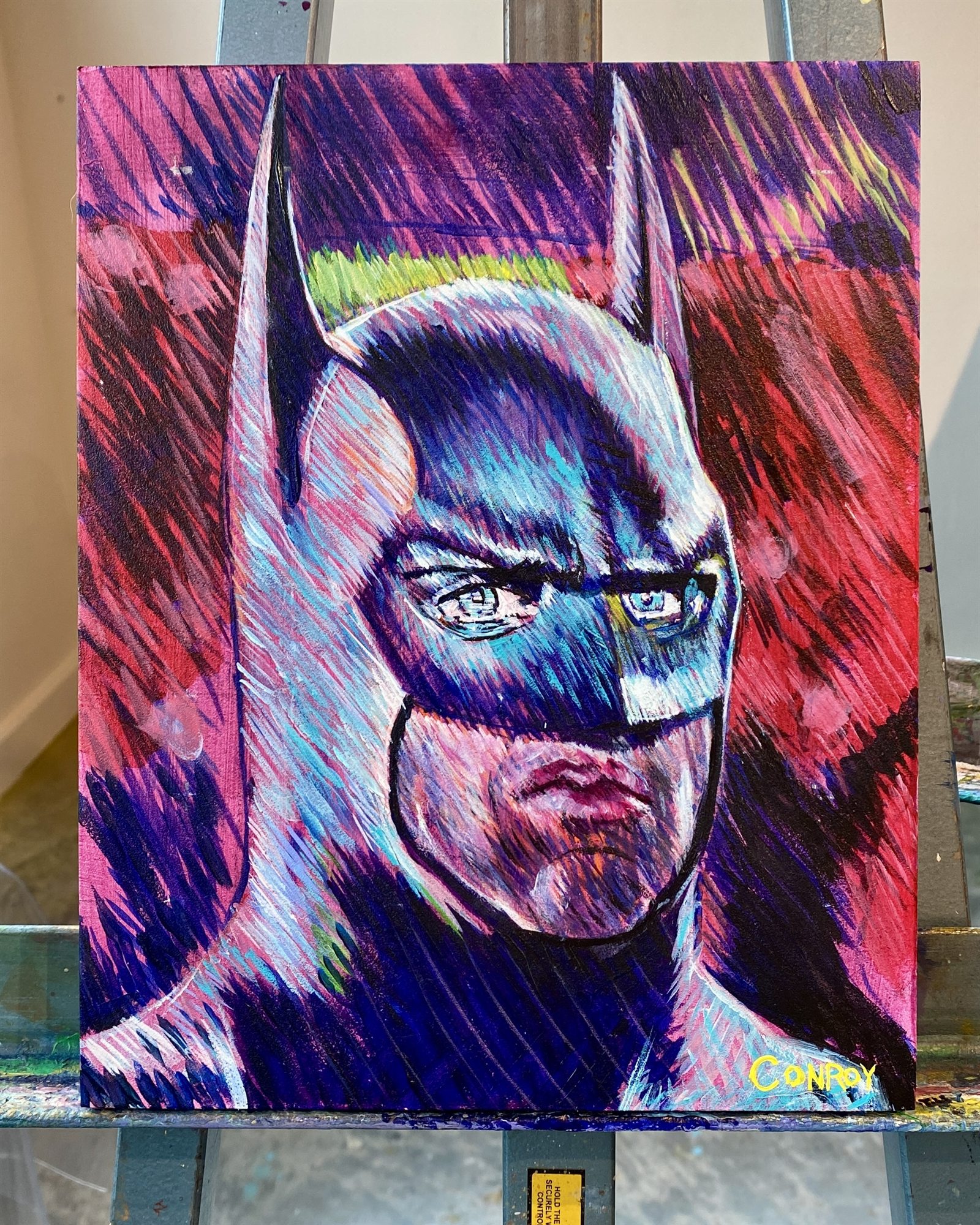 Painting of a masked comic-inspired figure in blue and purple tones against a red background.