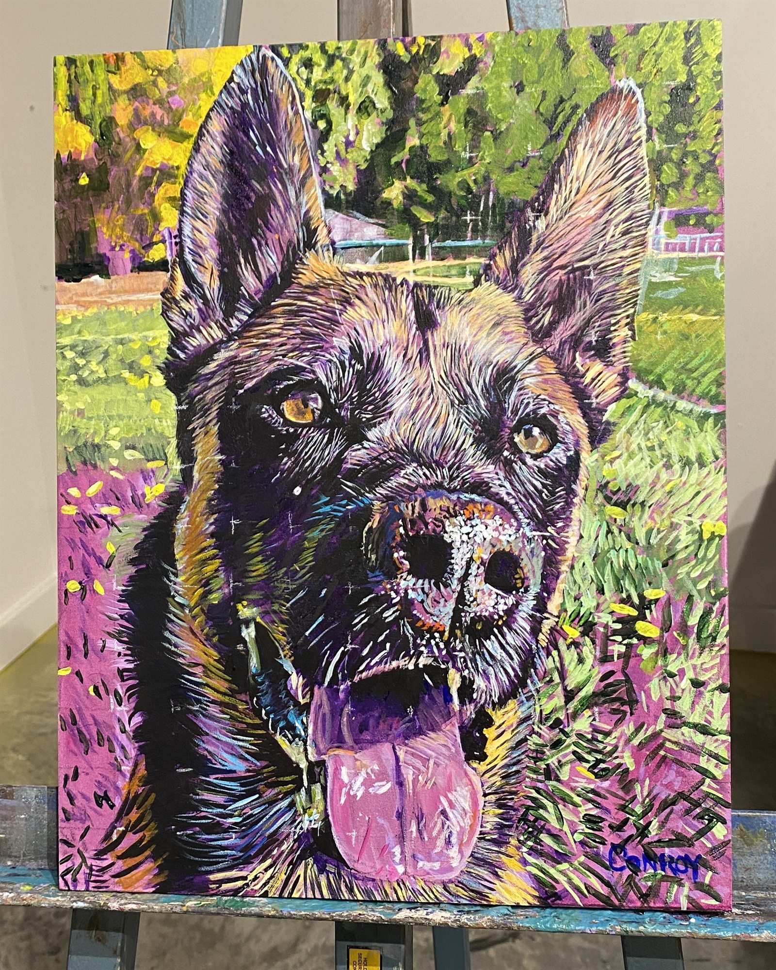 Bright painting of a German shepherd dog in a green and pink garden-like setting.