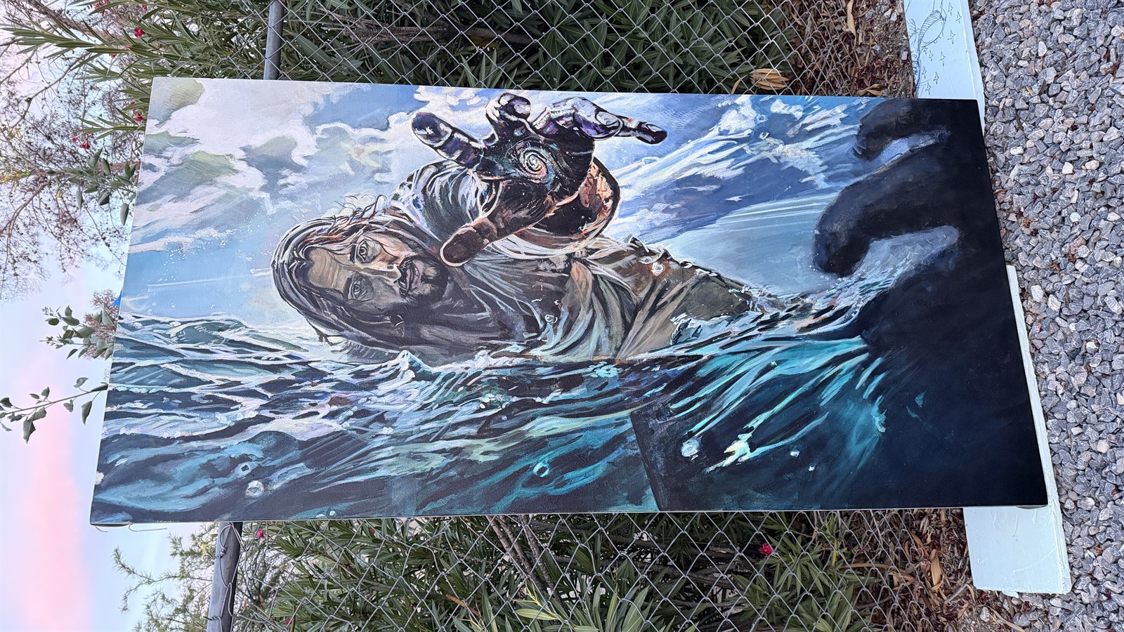 Wide painting of a figure surfacing through dark blue water with expressive white and teal strokes.